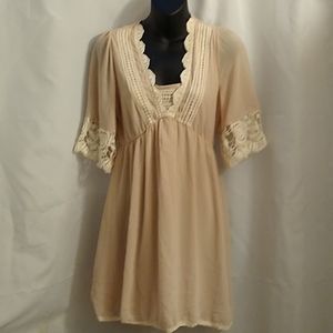 Margo and Sebastian Cream dress with white lace accents